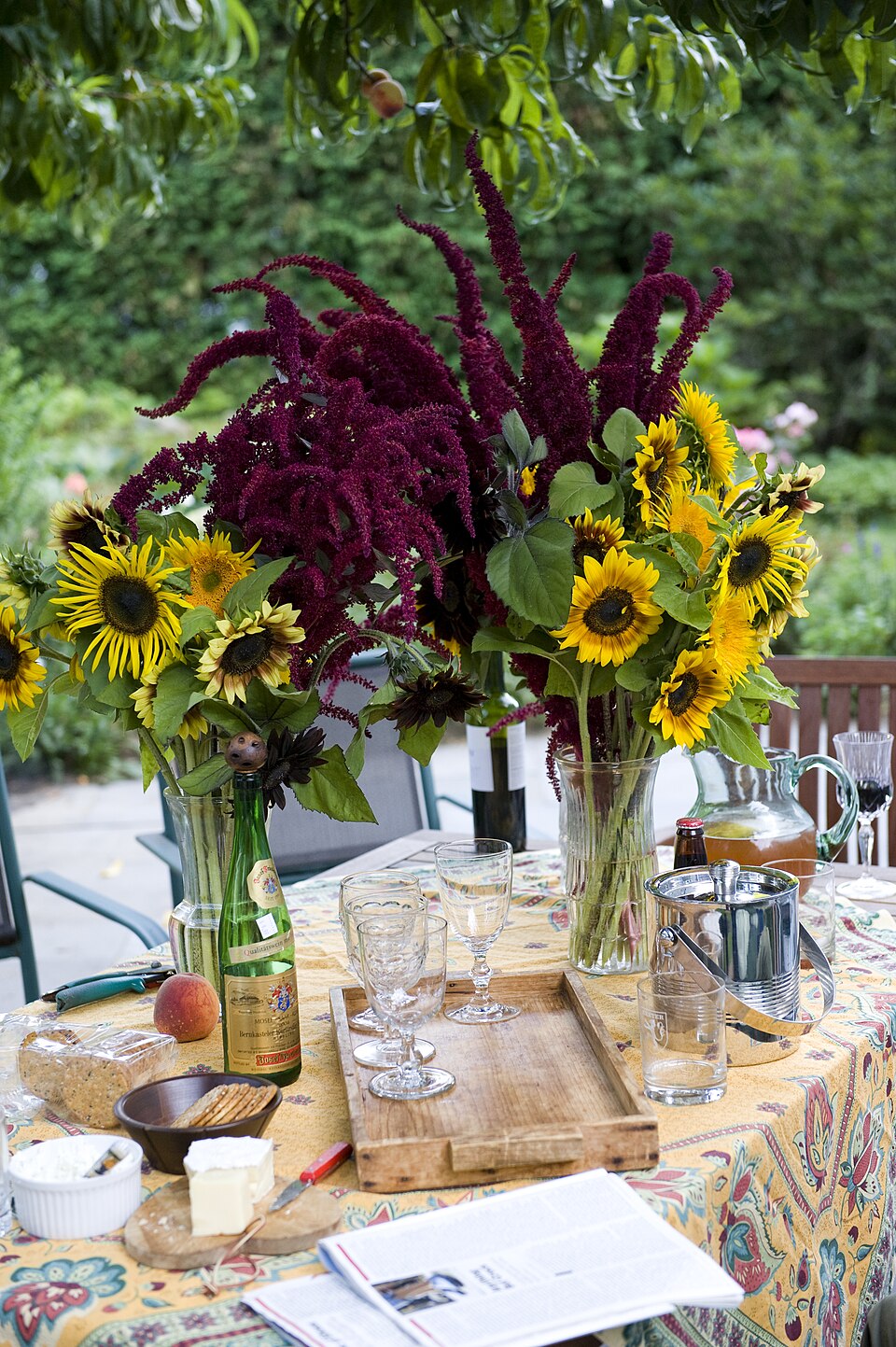 Sunflowers and trailing amaranthus in a party arrangement