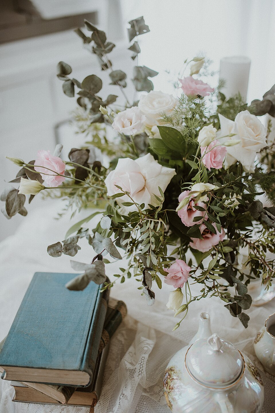 Pink and white roses in a table arrangement
