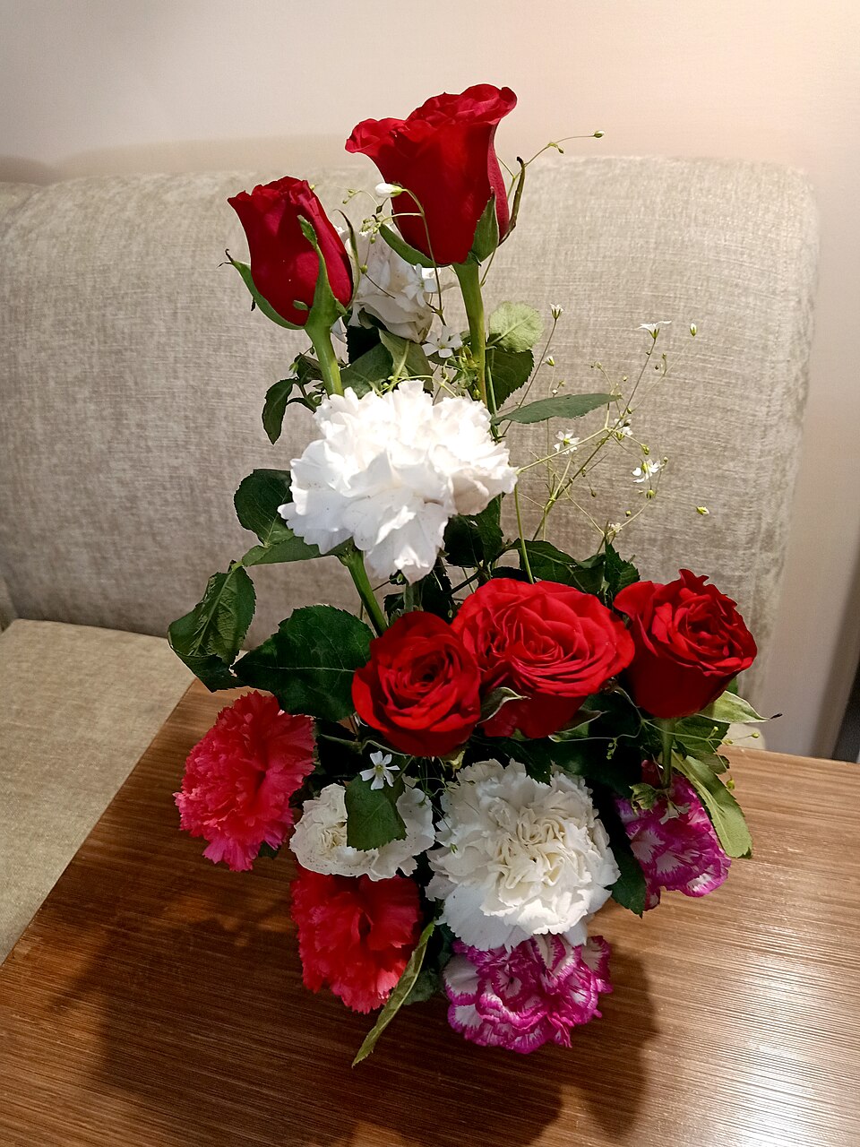 Roses and carnations in a mixed bouquet
